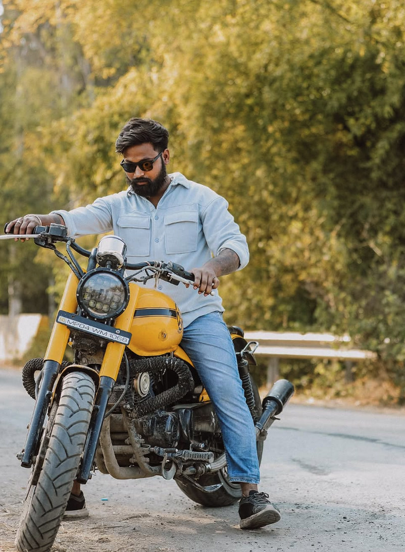 Devansh Singh on custom yellow cruiser motorcycle for biker pre-wedding concepts
